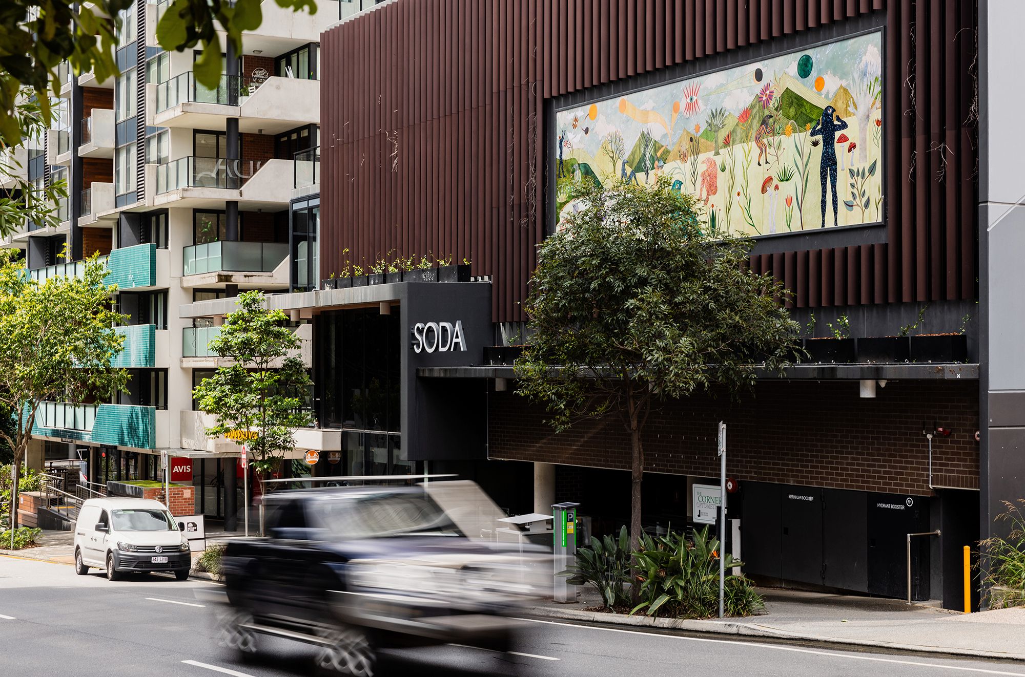 Rithika Merchant's If the Seeds Chose Where to Grow 2024 installation at the Soda Apartments Cordelia Street Banner, South Brisbane