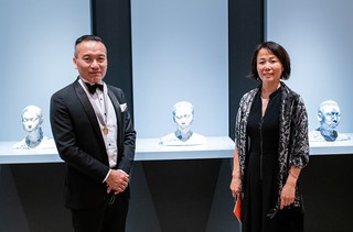 Ah Xian and his wife Ma Li with porcelain busts from his series ‘China China’ 1998