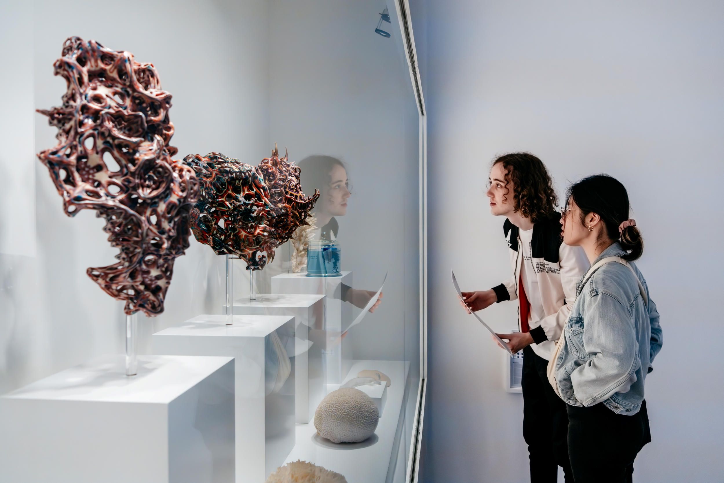 Patrons enjoying the art within Iris van Herpen: Sculpting the Senses / June, 2024 / Gallery of Modern Art, Brisbane / Photography: J. Ruckli, QAGOMA