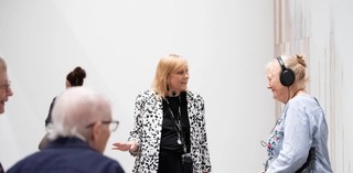 A volunteer guided tour for visitors with hearing loss at the Queensland Art Gallery. Photography: M. Sherwood © QAGOMA