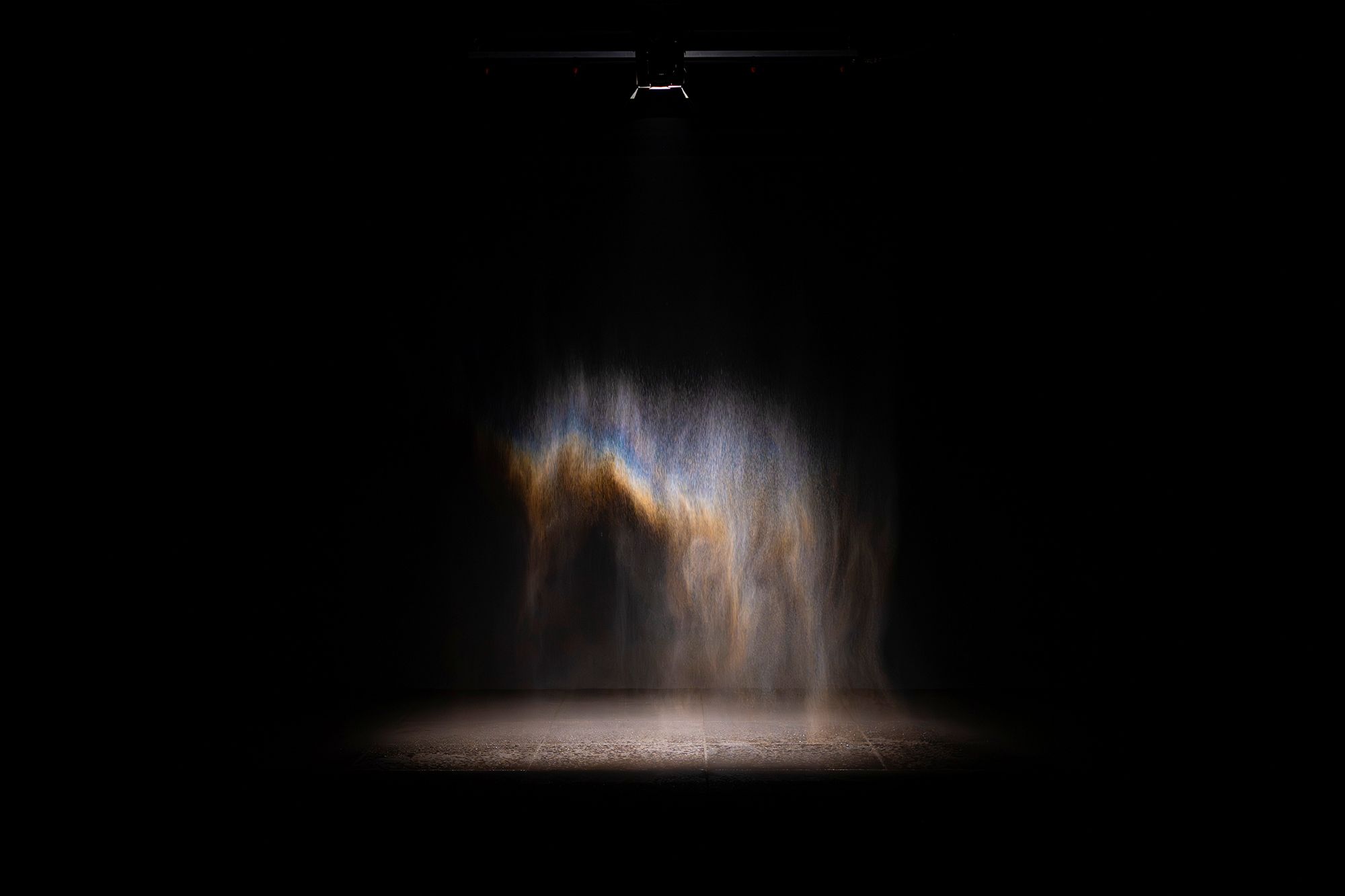 Olafur Eliasson, Denmark b.1967 / Beauty 1993 / Spotlight, water, nozzles, hose, pump / Purchased 2025. The Josephine Ulrick and Win Schubert Charitable Trust / Collection: The Josephine Ulrick and Win Schubert Charitable Trust, Queensland Art Gallery | Gallery of Modern Art / © 1993 Olafur Eliasson / Photograph: N Umek © QAGOMA