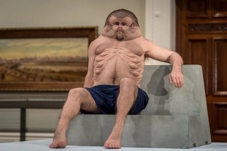 Patricia Piccinini, Australia b.1965 / Graham 2016 / Silicone, fibreglass, human hair, clothing, concrete / 140 x 120 x 170cm / Courtesy: TAC (Transport Accident Commission) / © The artist