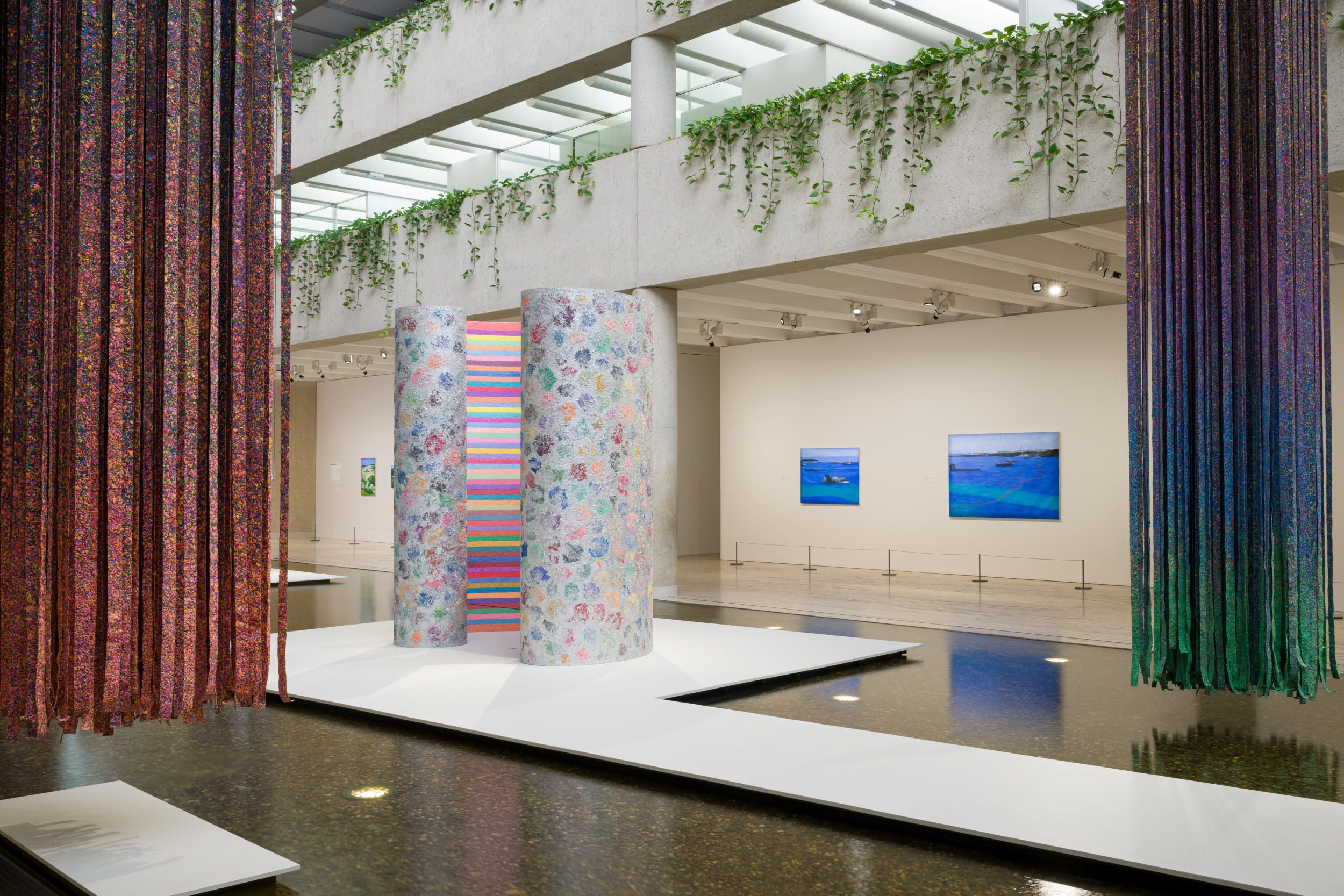 Mit Jai Inn, Thailand b.1960 / Installation view Untitled (Scroll #APT) 2024 / Oil on canvas / Purchased 2024 with funds from Tim Fairfax AC through the QAGOMA Foundation / Collection: Queensland Art Gallery | Gallery of Modern Art; Untitled (Totem #APT) 2024 / © Mit Jai Inn / Courtesy: The artist and Silverlens, Manila and New York / Photograph: C Callistemon © QAGOMA