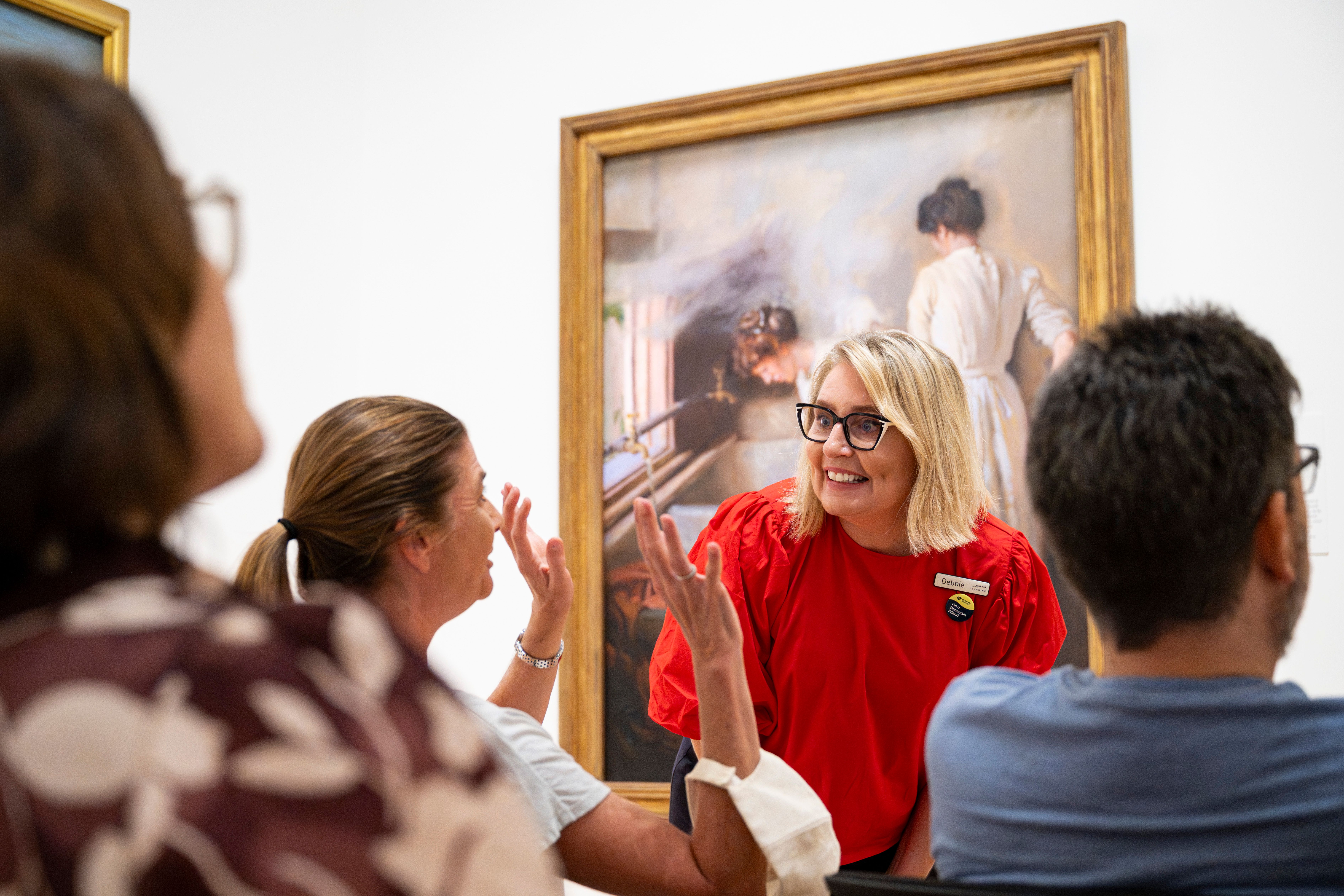 Art and Dementia program participants engage in guided slow-viewing / Photograph: C Callistemon / © QAGOMA