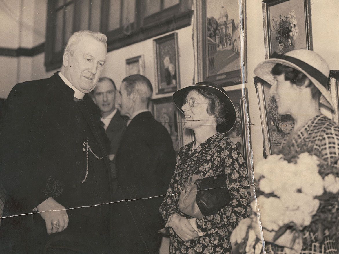 (l-r) Archbishop James Duhig, Daphne Mayo and Vida Lahey at the opening of Lahey’s exhibition, Griffiths Tea Rooms, Queen Street, Brisbane, 16 October 1934 / Daphne Mayo Collection, UQFL119 / Courtesy: The University of Queensland, Brisbane