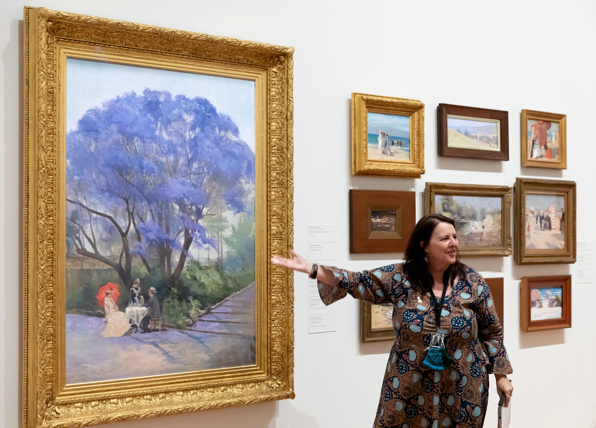 A QAGOMA Volunteer Guide engages visitors with Collection works on a Guided Tour at the Queensland Art Gallery / Photograph: C Baxter / © QAGOMA / /