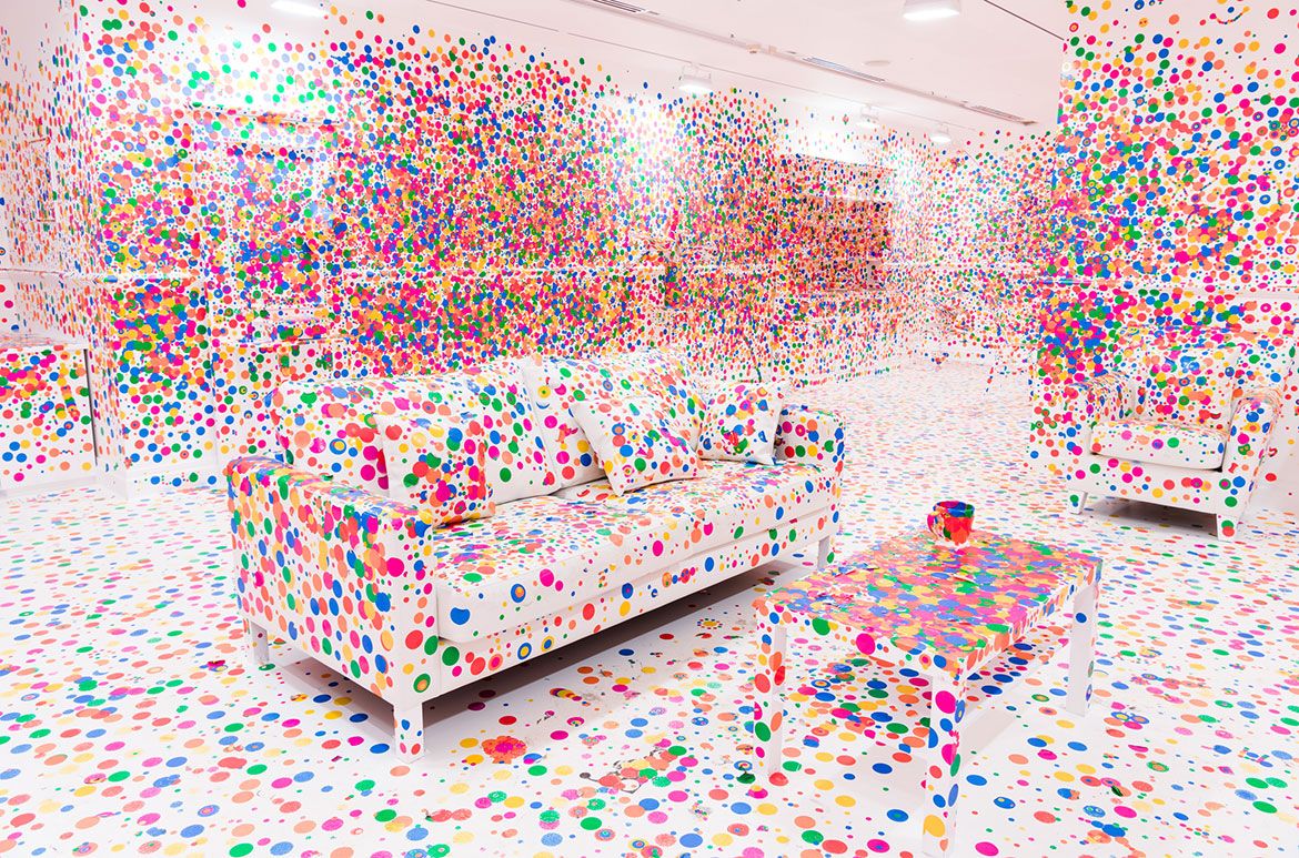 Yayoi Kusama, Japan b.1929 / The obliteration room (installation view) 2002 to present / Furniture, white paint, dot stickers / Collaboration between Yayoi Kusama and Queensland Art Gallery, commissioned by the Queensland Art Gallery / Gift of the artist through the Queensland Art Gallery Foundation 2012 / Collection: Queensland Art Gallery / © Yayoi Kusama / Courtesy: Yayoi Kusama Studio, Inc.