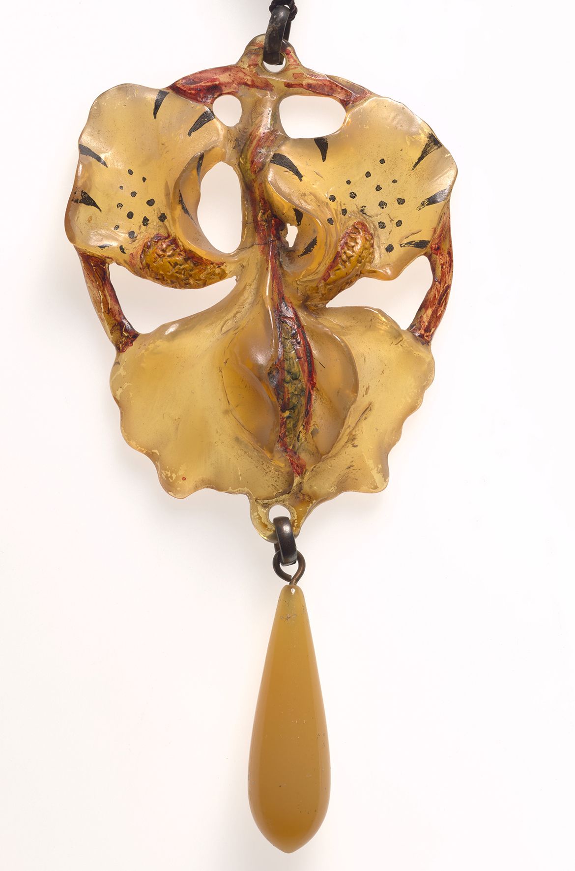 attrib. to Georges Pierre, France 1873–1943 (or Elisabeth Bonté, France dates unknown) / Orchid pendant necklace (detail) c.1900 / Horn, yellow glass, silk chord / 50cm (length); 10.5 x 5.5cm (pendant) / Purchased 2021 with funds from the Henry and Amanda Bartlett Trust through the QAGOMA Foundation / Collection: Queensland Art Gallery | Gallery of Modern Art 