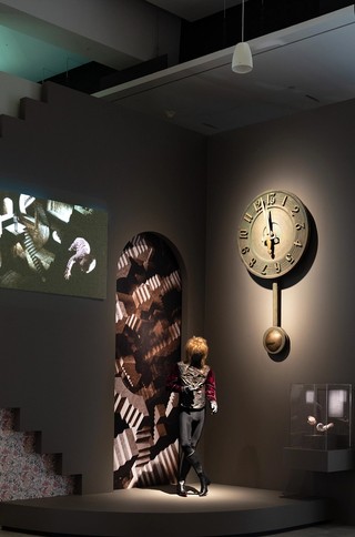 Jim Henson (director), United States 1936–90; Brian Froud (designer), England b.1947; Installation view ‘Fairy Tales’, Gallery of Modern Art (GOMA) Brisbane, 2023 featuring ‘Jareth’ costume worn by the actor playing the Goblin King, designed by Brian Froud for Jim Henson’s Labyrinth 1986; Leather, velvet, resin, synthetic; Collection: Museum of the Moving Image, Queens, New York / Jim Henson Company (designer); 13-hour clock from Labyrinth 1986; Fibreglass and wood; 203 x 111.8 x 24.2cm; Jim Henson Company (designer); Crystal orbs from Labyrinth 1986; Plastic; Two orbs: 8.9 x 8.9 x 8.9cm (each); Collection: Center for Puppetry Arts, Atlanta / Photograph: N Umek © QAGOMA