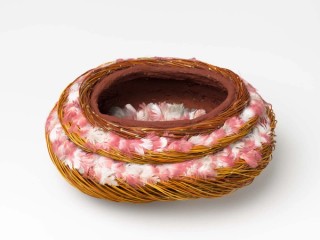 Shirley Macnamara, Indjalandji/Alyawarr, Queensland Australia b.1949 / Erkel (vessel) 2010 / Twined spinifex (Triodia pungens), red ochre, galah feathers, nylon thread and synthetic polymer fixative / 14 x 31 x 25cm / Purchased 2010 with funds from the Bequest of Grace Davies and Nell Davies through the QAG Foundation / Collection: Queensland Art Gallery | Gallery of Modern Art / © Shirley Macnamara