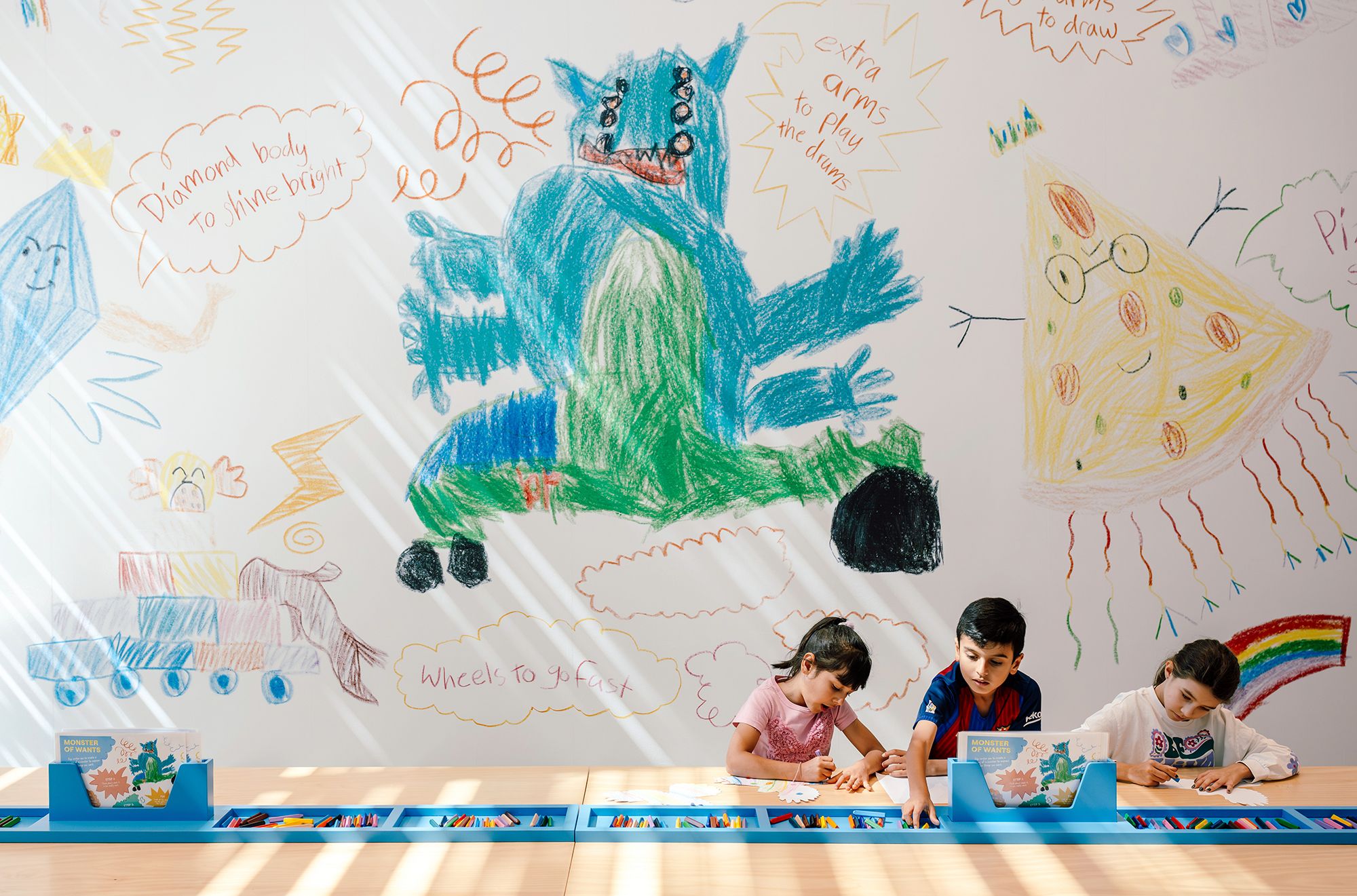 Harold ‘Egn’ Eswar, Malaysia b.1980 / Monster of Wants 2024 / Paper, crayons, vinyl, MDF, paint / A collaboration between Harold ‘Egn’ Eswar and QAGOMA / Commissioned for Asia Pacific Triennial Kids with support from the Tim Fairfax Family Foundation / © Harold ‘Egn’ Eswar / Photograph by J Ruckli © QAGOMA
