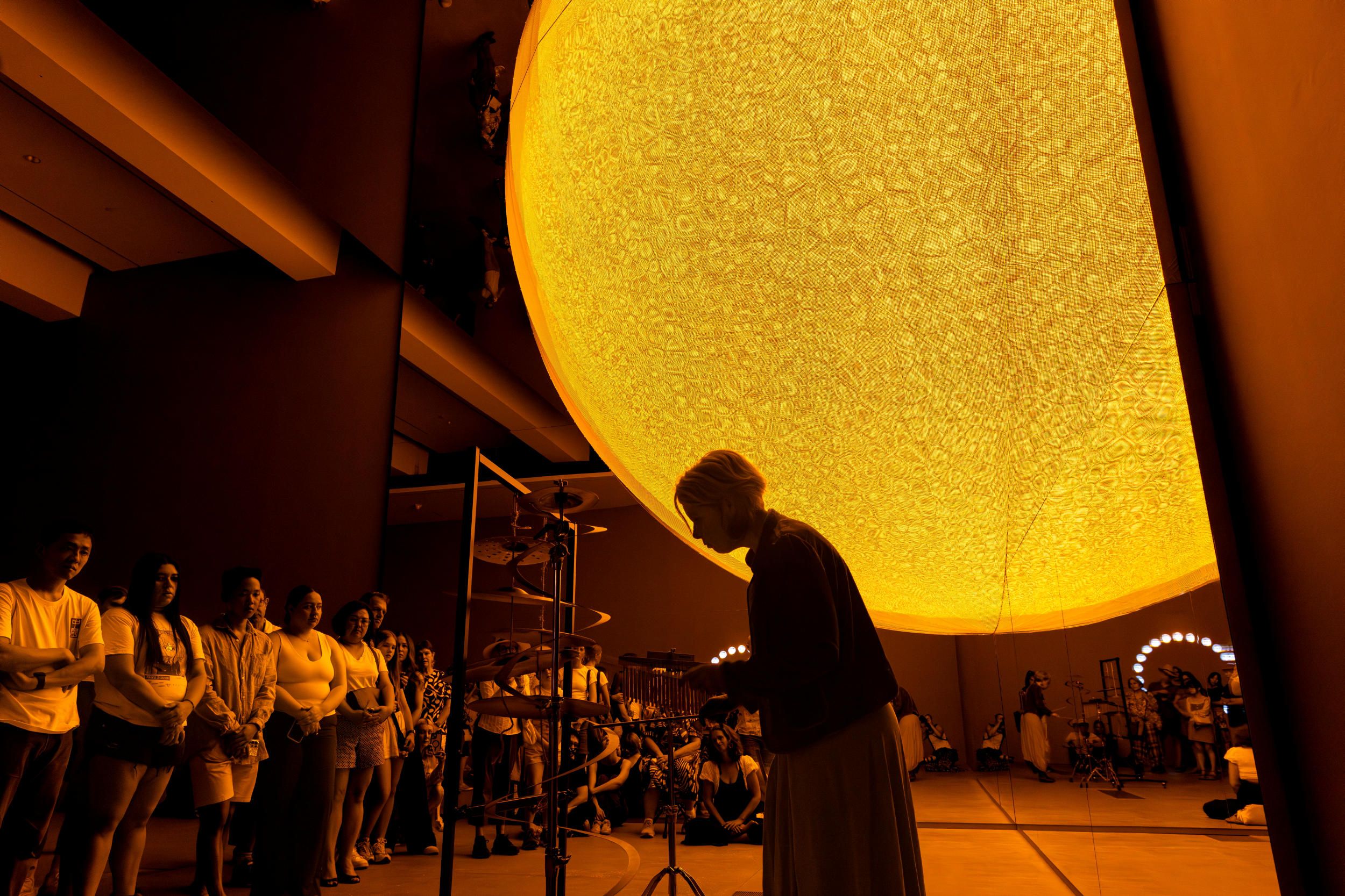 Pop up performance at opening weekend of ‘Olafur Eliasson: Presence’, led by artist Vanessa Tomlinson, inside the Gallery of Modern Art, Brisbane, December 2025 / Photograph: C Baxter / Image courtesy: QAGOMA