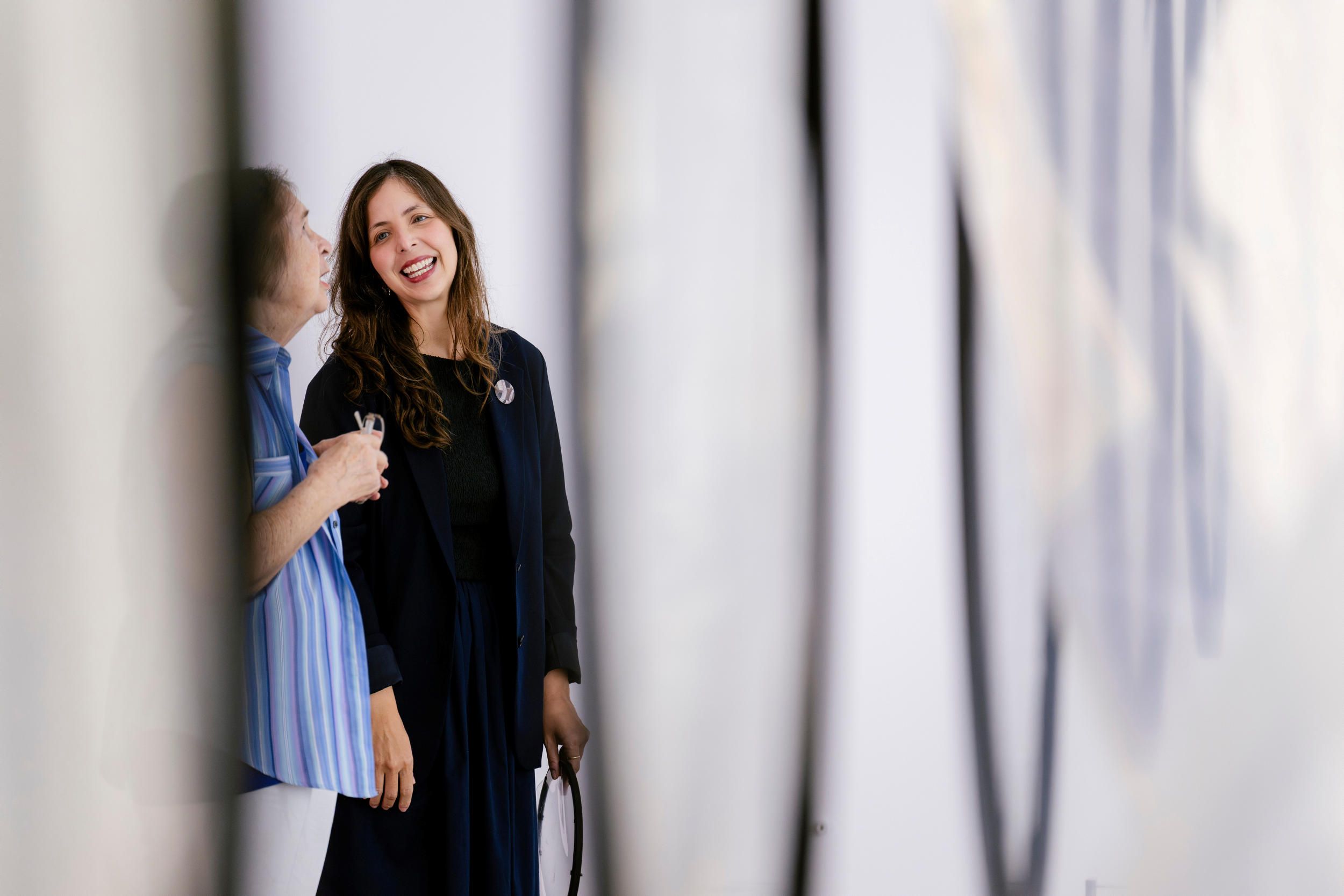 A Volunteer Guide leads visitors on a tour at the Gallery of Modern Art. Photography: Joe Ruckli | QAGOMA