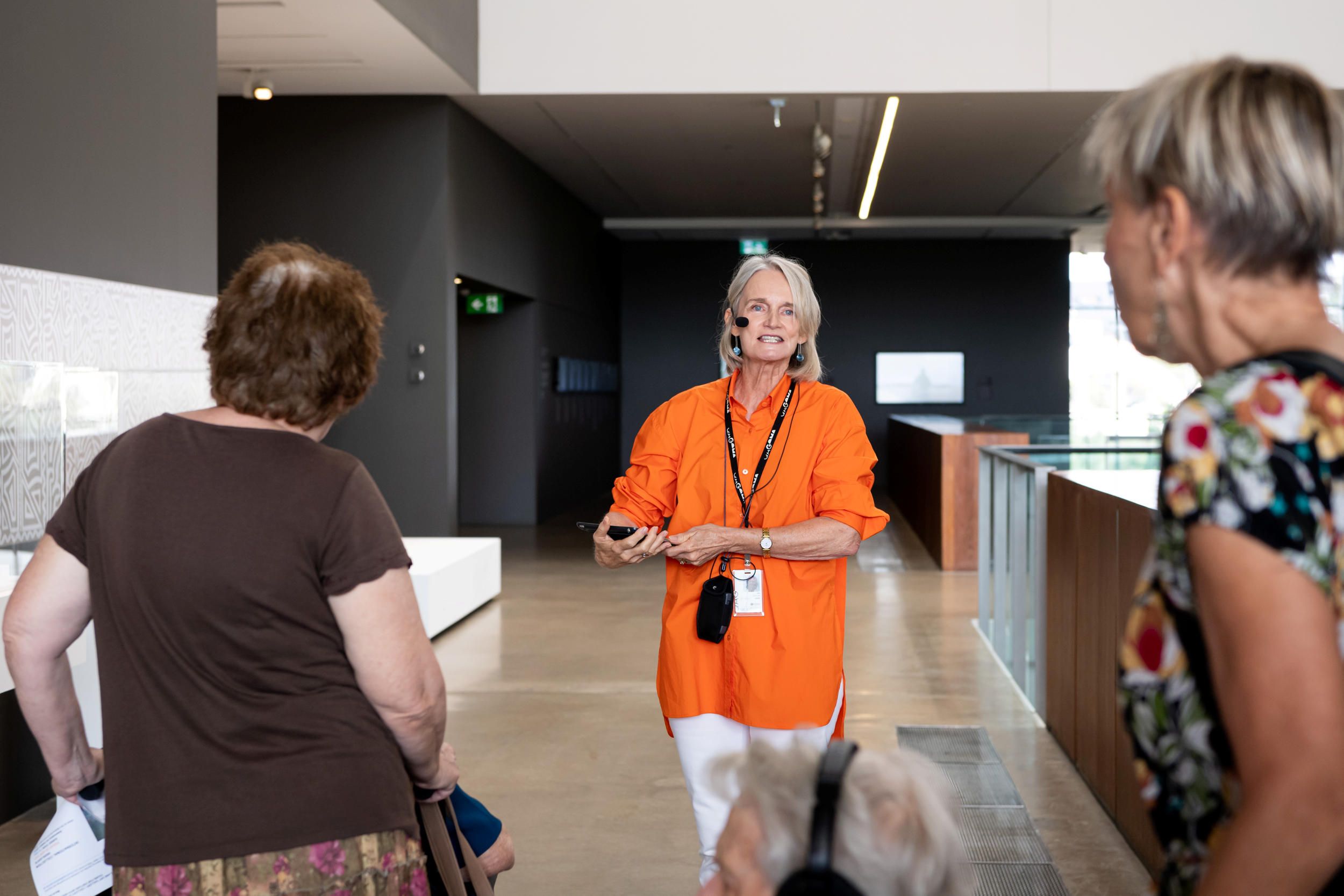 A volunteer guided tour for visitors with hearing loss at GOMA. Photography by Photography: C. Callistemon, QAGOMA