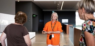 A volunteer guided tour for visitors with hearing loss at GOMA. Photography by Photography: C. Callistemon, QAGOMA