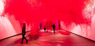 Chiharu Shiota, Japan/Germany b.1972 / Installation view of Uncertain Journey 2016/2022 in ‘Chiharu Shiota: The Soul Trembles’, Gallery of Modern Art, Brisbane / Metal frame, red wool / © Chiharu Shiota / Photograph: N Harth © QAGOMA