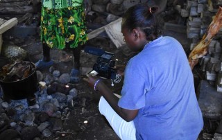 Jesmaine Sakoi Gano filming, Women’s Wealth Workshop, Nazareth Rehabilitation Centre, Chabai, September 2017 / Photograph Ruth McDougall © QAGOMA