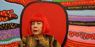 Image: Yayoi Kusama in front of Life is the Heart of a Rainbow(2017) ©YAYOI KUSAMA, Courtesy of Ota Fine Arts, Tokyo/Singapore, Victoria Miro, London, David Zwirner, New York, YAYOI KUSAMA Inc.