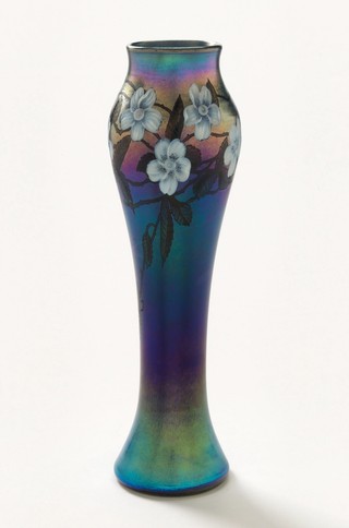 Louis Comfort Tiffany, United States 1848-1933 / Baluster vase 1892-93 / Blue iridescent glass body in baluster shape, with white padded and carved flowers, engraved trails and stained leaves / 38.5 x 11cm / Purchased 1983 / Collection: Queensland Art Gallery | Gallery of Modern Art