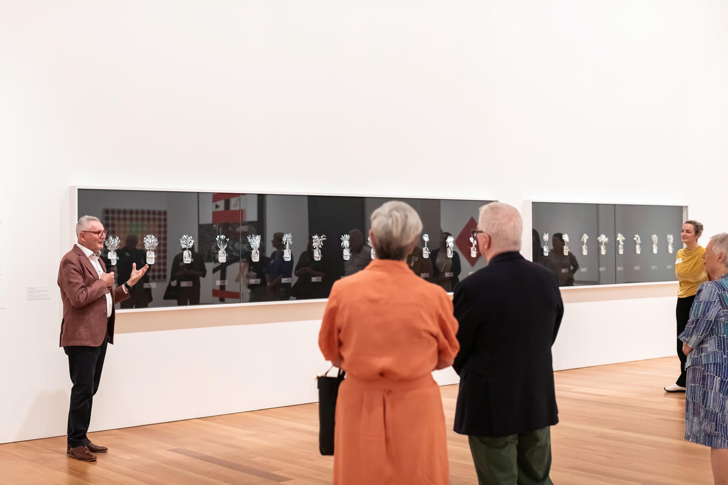Members of the Schubert Circle enjoy a tour of artworks acquired through bequests on display at the Queensland Art Gallery during their annual event, QAG, 2022 / Photograph: K Bennett
