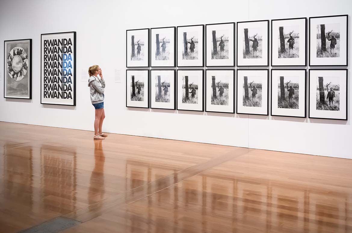 Installation view of the exhibition, featuring Alfredo Jaar’s Rwanda 1994 / Purchased 1996 with a special allocation from the Queensland Government. Celebrating the Queensland Art Gallery’s Centenary 1895-1995; and Mike Parr’s Identification no. 1 (Rib markings in the Carnarvon Ranges, North-West Queensland) 1975, printed 1999 / Gift of the artist through the Queensland Art Gallery Foundation 2000. Donated through the Australian Government’s Cultural Gifts Program /
Photograph: Chloë Callistemon
