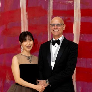 2026 QAGOMA Medal recipient Paul Spiro and Naoko Spiro at the Foundation Annual Dinner, August 2026, QAG (in front of) Tony Tuckson / Egypt/England/Australia / 1921–1973 / 'Pink lines (vertical) on red and purple' 1970–73 / Synthetic polymer paint on composition board / Two panels: 213.5 x 244.5cm (overall) / Purchased 1998. Queensland Art Gallery Foundation / Collection: Queensland Art Gallery | Gallery of Modern Art / © Tony Tuckson/Copyright Agency / Photograph: C Baxter