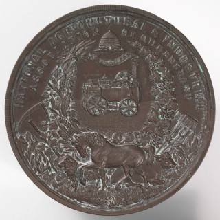 Robert Capner, England/ Queensland Australia 1833–99 / National Agricultural and Industrial Association of Queensland medallion presented to Bessie Gibson - First Prize, Drawing, Juvenile Exhibition, 1883 (Verso) 1883 / Bronze / 7.2 (diam.) x .6cm / Gift of Dr W Lockhart Gibson 1975 / Collection: Queensland Art Gallery | Gallery of Modern Art