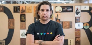 Tony Albert in his Carriageworks studio, Sydney, 2018 / Photograph: Mark Pokorny