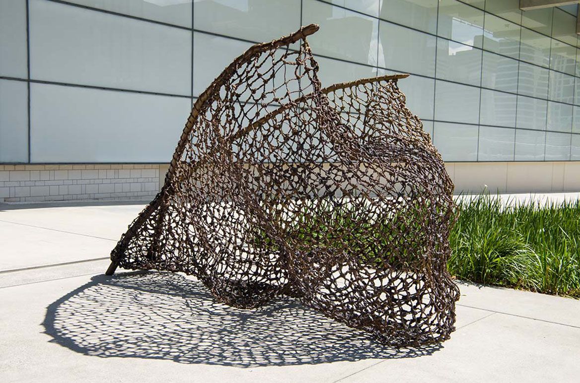 Judy Watson, Waanyi people, Australia b.1959 / tow row 2016 / Bronze / 193 x 175 x 300cm (approx.) / Commissioned 2016 to mark the tenth anniversary of the opening of the Gallery of Modern Art. This project has been realised with generous support from the Queensland Government, the Neilson Foundation and Cathryn Mittelheuser AM, through the QAGOMA Foundation / Collection: Queensland Art Gallery | Gallery of Modern Art / © Judy Watson
