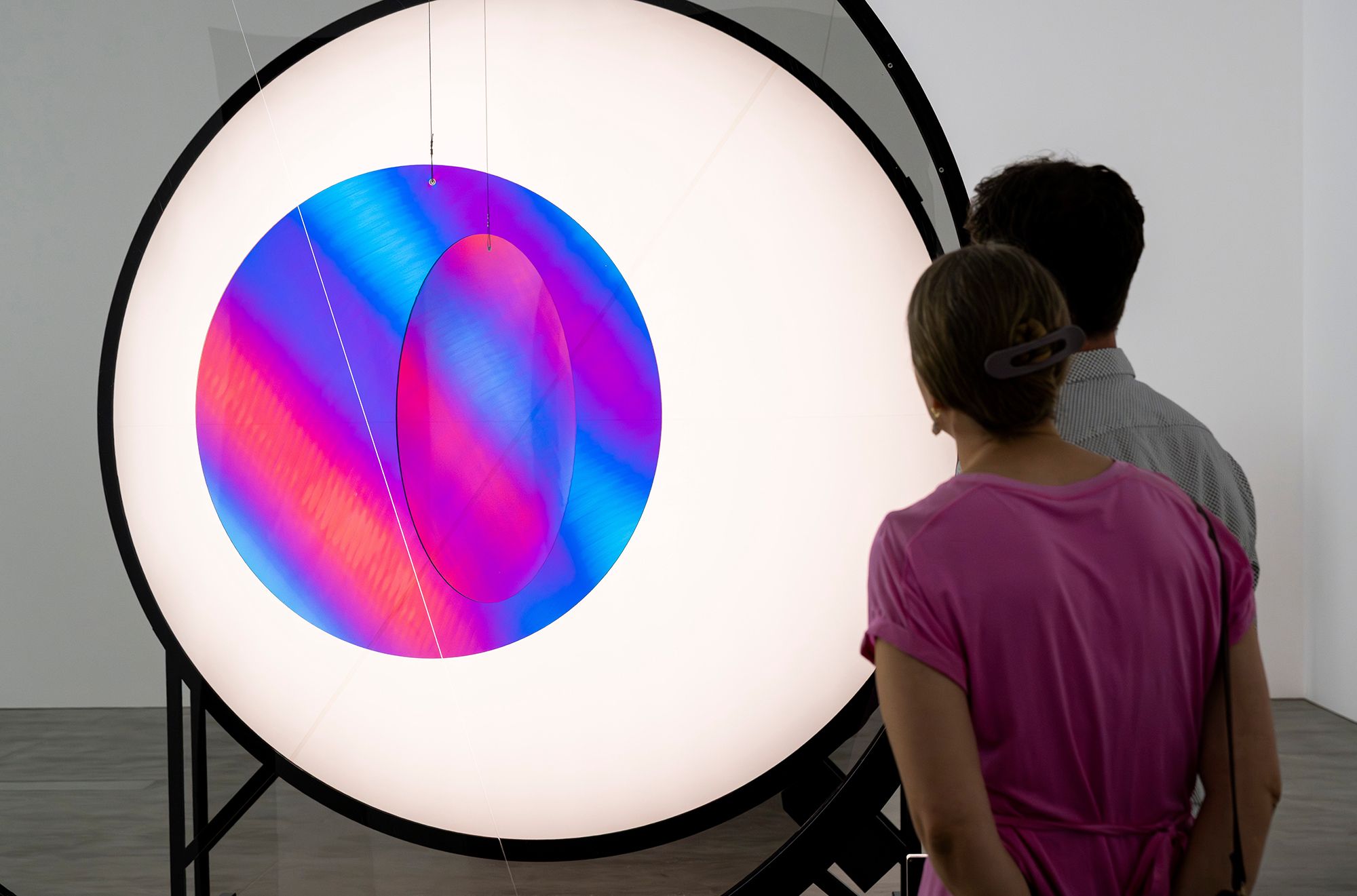 Olafur Eliasson, Denmark b.1967 / Your negotiable vulnerability seen from two perspectives 2025 / Polarisation filters, steel, wood, LEDs, motors, electrical ballast, polyhedron (PVC, resin, motor, control unit) / © 2025 Olafur Eliasson / Courtesy: The artist; neugerriemschneider, Berlin; and Tanya Bonakdar Gallery, New York / Photograph: C Callistemon © QAGOMA