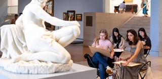 Visitors sketch Giacomo Ginotti's 19th century sculpture Lucretia at the Drawing Festival, QAG, May 2025 / Photograph: Katie Bennett, courtesy QAGOMA