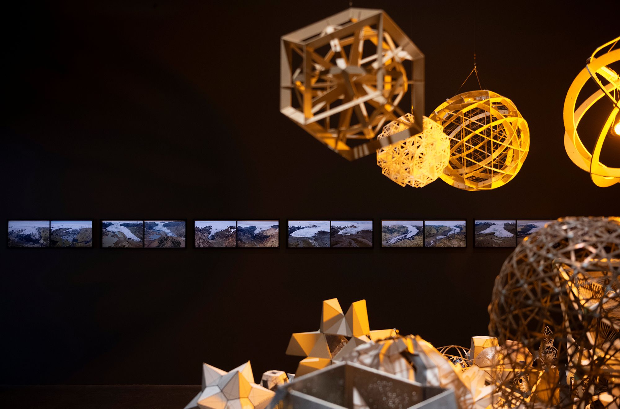 Installation view of 'Olafur Eliasson: Presence' at the Gallery of Modern Art, Brisbane including (back) Olafur Eliasson, Denmark b.1967; The glacier melt series 1999/2019 2019; and (front) Model for your circular city 2024 / © Olafur Eliasson / Courtesy: The artist; neugerriemschneider, Berlin; and Tanya Bonakdar Gallery, New York / Photograph: N Umek © QAGOMA