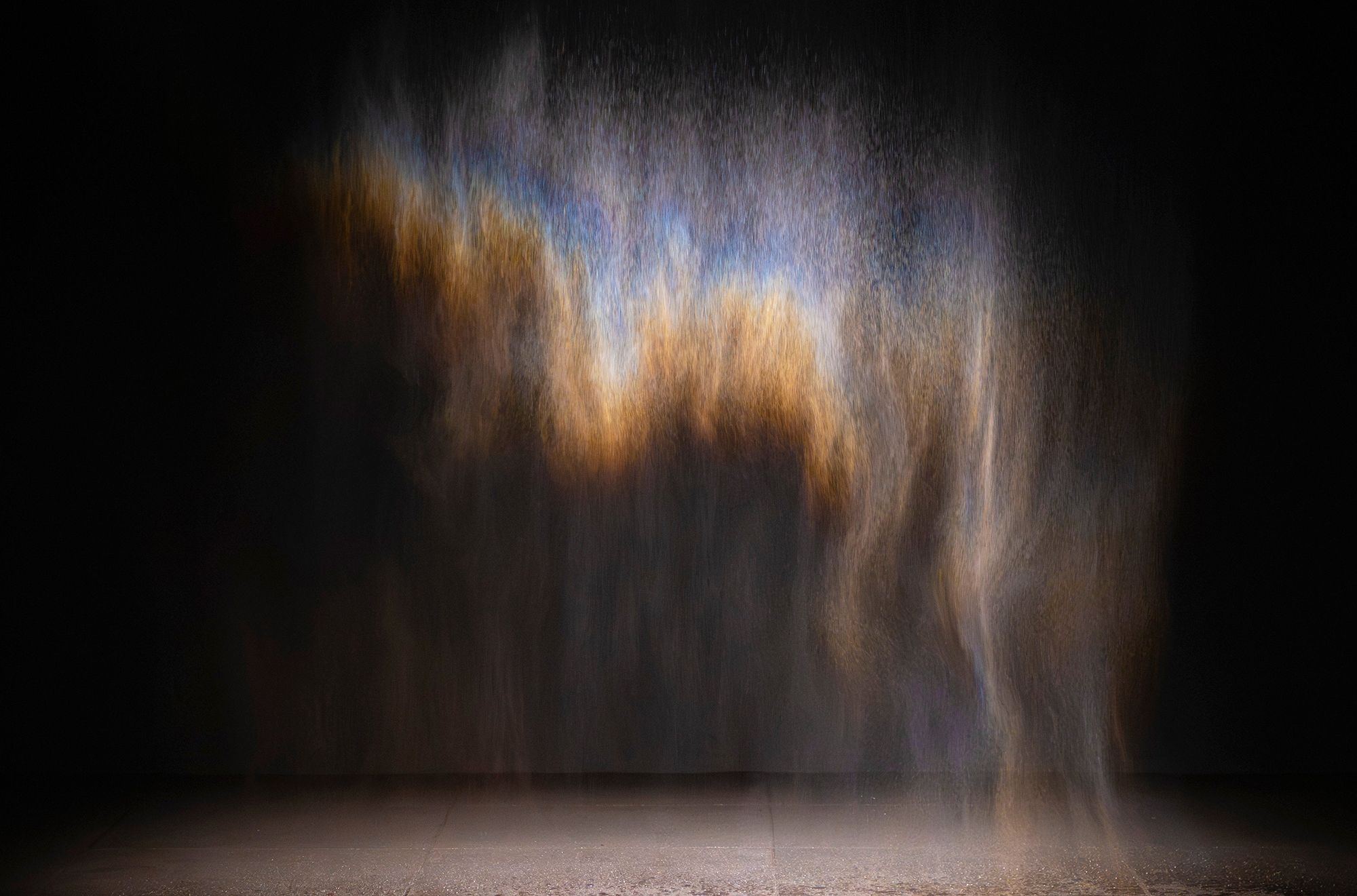 Olafur Eliasson, Denmark b.1967 / Beauty 1993 / Spotlight, water, nozzles, hose, pump / Purchased 2025. The Josephine Ulrick and Win Schubert Charitable Trust / Collection: The Josephine Ulrick and Win Schubert Charitable Trust, Queensland Art Gallery | Gallery of Modern Art / © 1993 Olafur Eliasson / Photograph: N Umek © QAGOMA