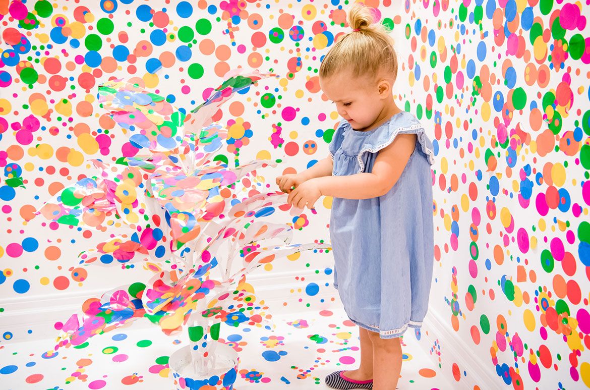 Yayoi Kusama, Japan b.1929 / The obliteration room 2002 to present / Furniture, white paint, dot stickers / Collaboration between Yayoi Kusama and Queensland Art Gallery. Commissioned Queensland Art Gallery, Australia. Gift of the artist through the Queensland Art Gallery Foundation 2012 / Collection: Queensland Art Gallery / © Yayoi Kusama
