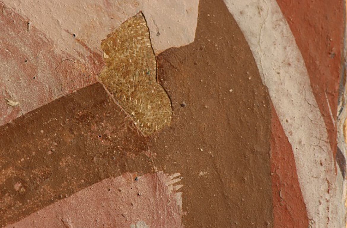 During the overpaint removal, the first image in this series shows the dark brown overpaint, the second the overpaint removed and the third the paper pulp fill and the beginning of inpainting using watercolour. The last image shows the loss after treatment.