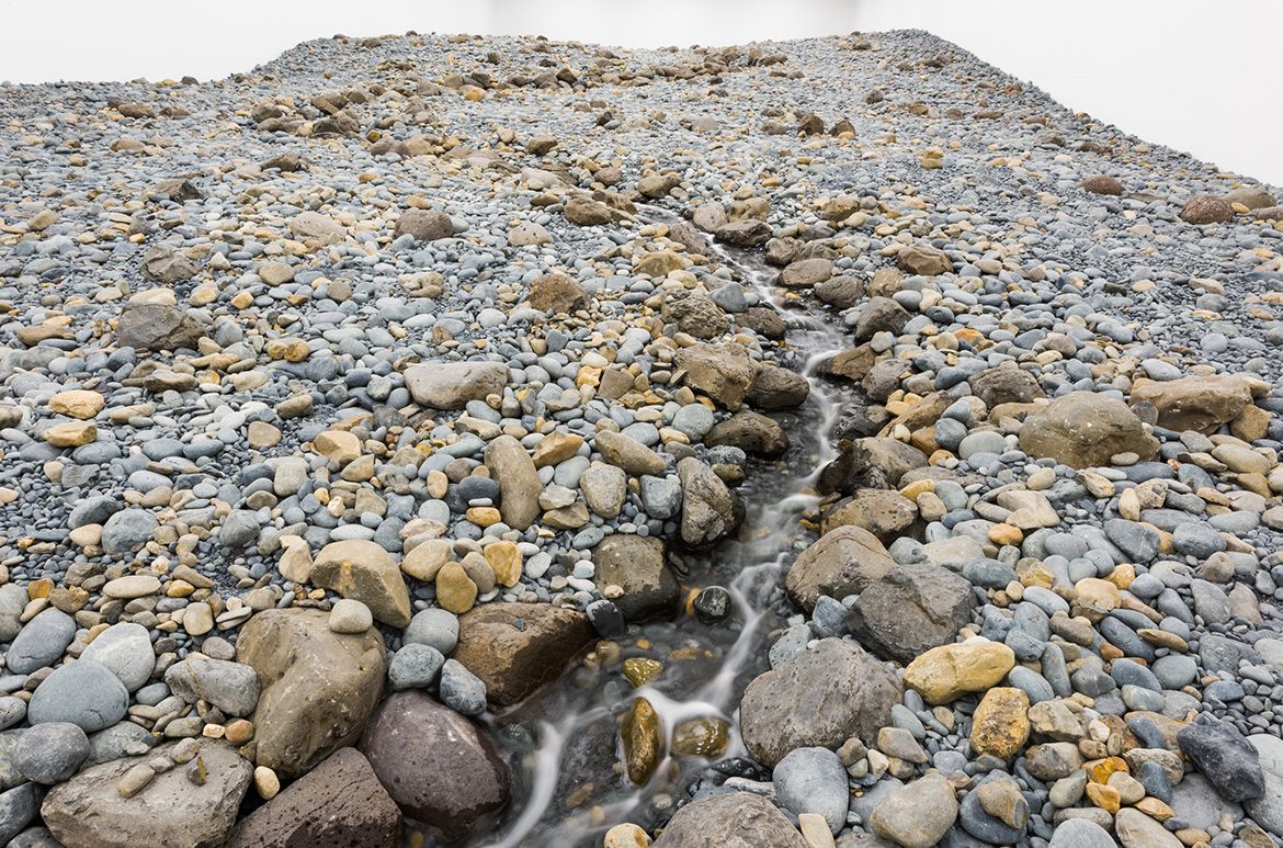 Olafur Eliasson, Denmark b.1967 / Riverbed 2014 (installation view, GOMA, 2019) / Water, rock (volcanic stones [blue basalt, basalt, lava], other stones, gravel, sand), wood, steel, plastic sheeting, hose, pumps / Purchased 2021. The Josephine Ulrick and Win Schubert Charitable Trust. Collection: The Josephine Ulrick and Win Schubert Charitable Trust, QAGOMA / Collection: Queensland Art Gallery | Gallery of Modern Art / © 2014 Olafur Eliasson / Photograph: N Harth © QAGOMA