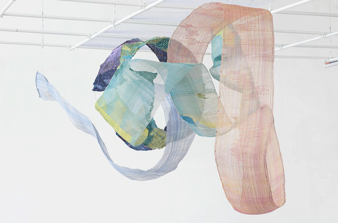 Yuma Taru, Atayal people, Taiwan b.1963 / The spiral of life – the tongue of the cloth (yan pala na hmali) – a mutual dialogue (installation view) 2021 / Ramie suspended from metal threads / 500 x 250cm / Commissioned for APT10 / © & courtesy: Yuma Taru