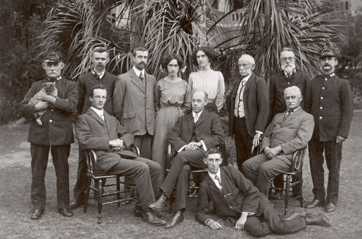 The staff of the Queensland Museum, 1912. (Standing L to R): ‘Chips’ Greensill, attendant/carpenter; William Baillie, attendant; Henry Hacker, entomologist; Eileen Murphy, stenographer; Clarice Sinnamon, librarian; Anthony Alder, taxidermist; Benjamin Harrison, chief attendant; E. Varey, attendant. (Seated L to R): Heber A. Longman, assistant scientist; Ronald Hamlyn-Harris, director; James Douglas Ogilby, ichtyologist. Reclining: Tom Marshall, cadet / Courtesy: Queensland Museum, Brisbane