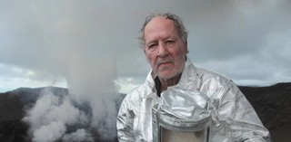 Werner Herzog filming Into the Inferno 2016 on Yasur Volcano, Tanna Island, Vanuatu / Photograph: Professor Clive Oppenheimer / Image courtesy: Netflix