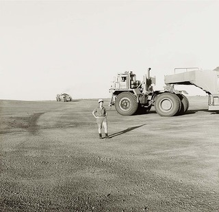 PAGE, Charles Australia b.1946 Lynn Cook, truck driver, Weipa (from ‘Journeys north’ portfolio) 1987 Gelatin silver photograph on paper 40 x 30.4cm 23.7 x 24.5cm (comp.) Acc. 1987.162.035 Purchased 1987 with the financial assistance of the Australian Bicentennial Authority to commemorate Australia’s Bicentenary in 1988