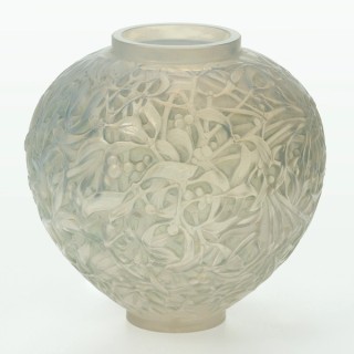 René Lalique, France 1860–1945 / Gui (Mistletoe) vase designed 1920 / Mould blown opalescent glass with pale grey patina / 16.8 x 17.3 x 17.3cm / Purchased 2018. QAGOMA Foundation / Collection: Queensland Art Gallery | Gallery of Modern Art