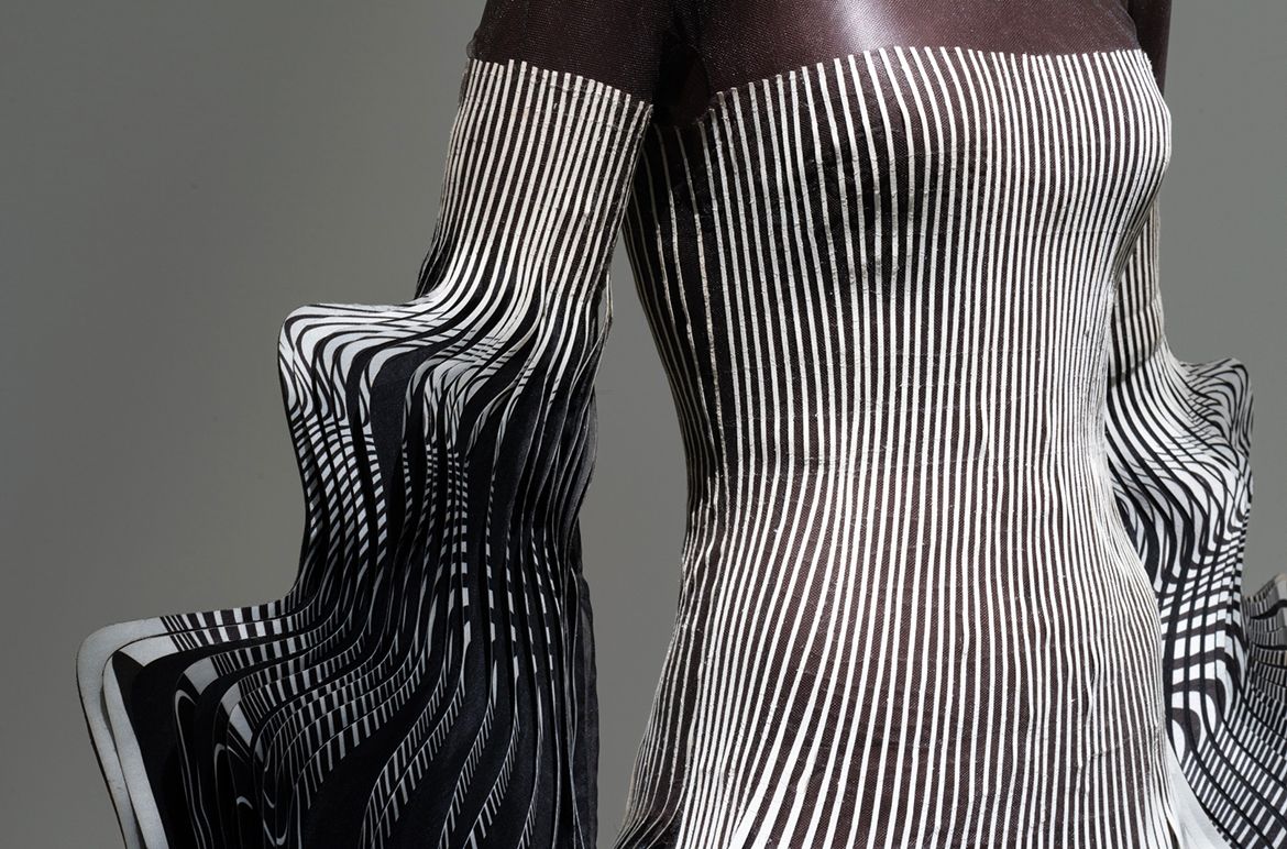 Iris van Herpen, Netherlands b.1984 / Dichotomy strapless gown, from the ‘Hypnosis’ collection (detail) 2019 / Laser-cut polyester silk, mylar, tulle, duchesse satin / © & courtesy: Iris van Herpen atelier