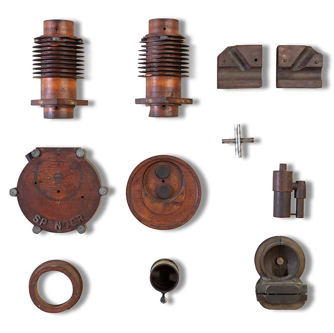 Surviving cedar and bronze patterns for casting motorcycle parts / Photograph: Penelope Clay, Australian Motorlife Museum
