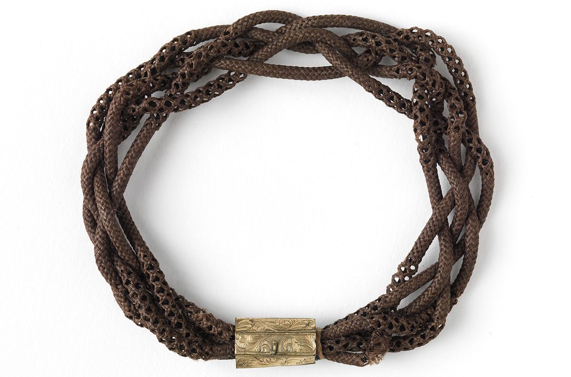 Unknown / Mourning bracelet c.1880-1900 / Hair with gold ring / 9cm (diam) / Gift of Miss M.B. McConnell 1958 / Collection: Queensland Art Gallery | Gallery of Modern Art