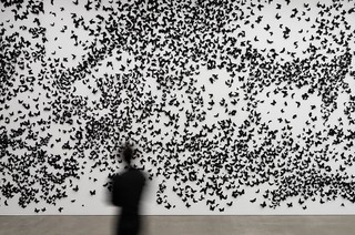 Carlos Amorales, Mexico b.1970 / Installation view of Black Cloud 2007/2018, ‘Air’ GOMA 2022 / 30 000 black laser-cut and handfolded paper butterflies (30 different butterfly and moth species in five sizes with a wave wing pattern), ed. 1/3 (+ 1 A.P.) / Purchased 2022 with funds from Tim Fairfax AC through the Queensland Art Gallery | Gallery of Modern Art Foundation / Collection: Queensland Art Gallery | Gallery of Modern Art / © Carlos Amorales / Photograph: M Campbell © QAGOMA