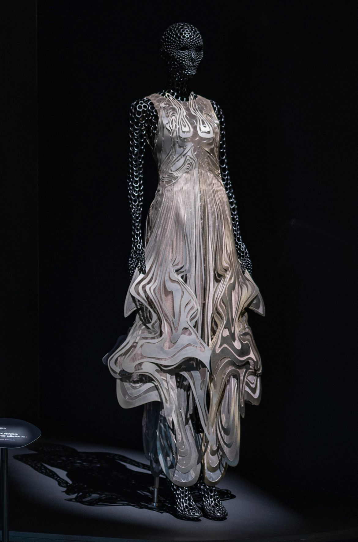Iris van Herpen, Netherlands b.1984 / Suminagashi dress, from the ‘Hypnosis’ collection 2019 / Polyurethane, mylar, tulle / Worn by Grimes in the music video Violence, a song written by Grimes and DJ and music producer i_o / © Iris van Herpen atelier / Photograph: N Umek © QAGOMA