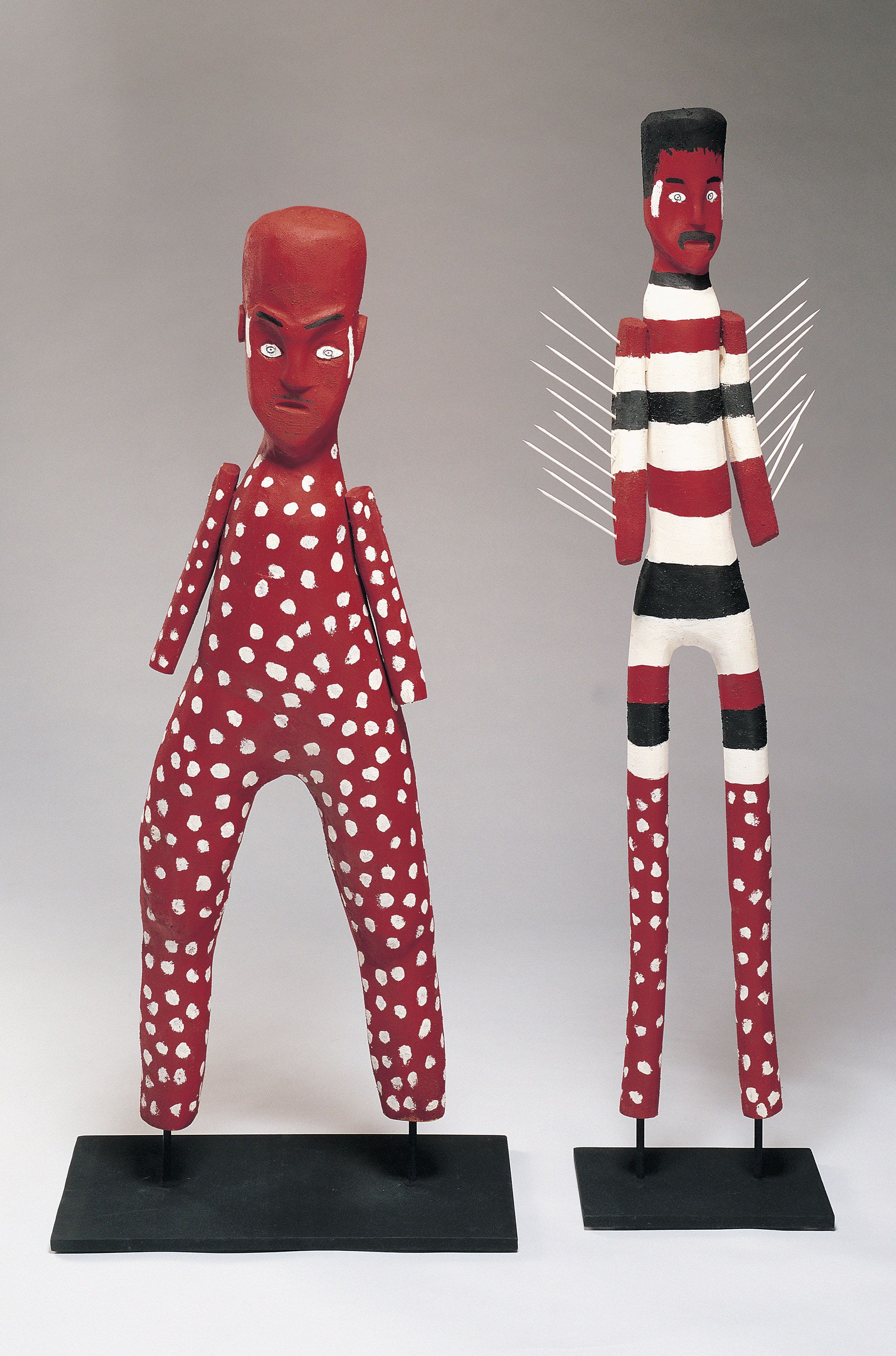 Craig Koomeeta, Wik-Alkan people, Australia b.1977 / Apelech brothers 2002 / Carved milkwood with natural pigments / Left figure: 112 x 35 x 15cm; right figure: 124 x 38 x 11cm / Purchased 2002. QAG Foundation / Collection: Queensland Art Gallery | Gallery of Modern Art / © Craig Koomeeta
