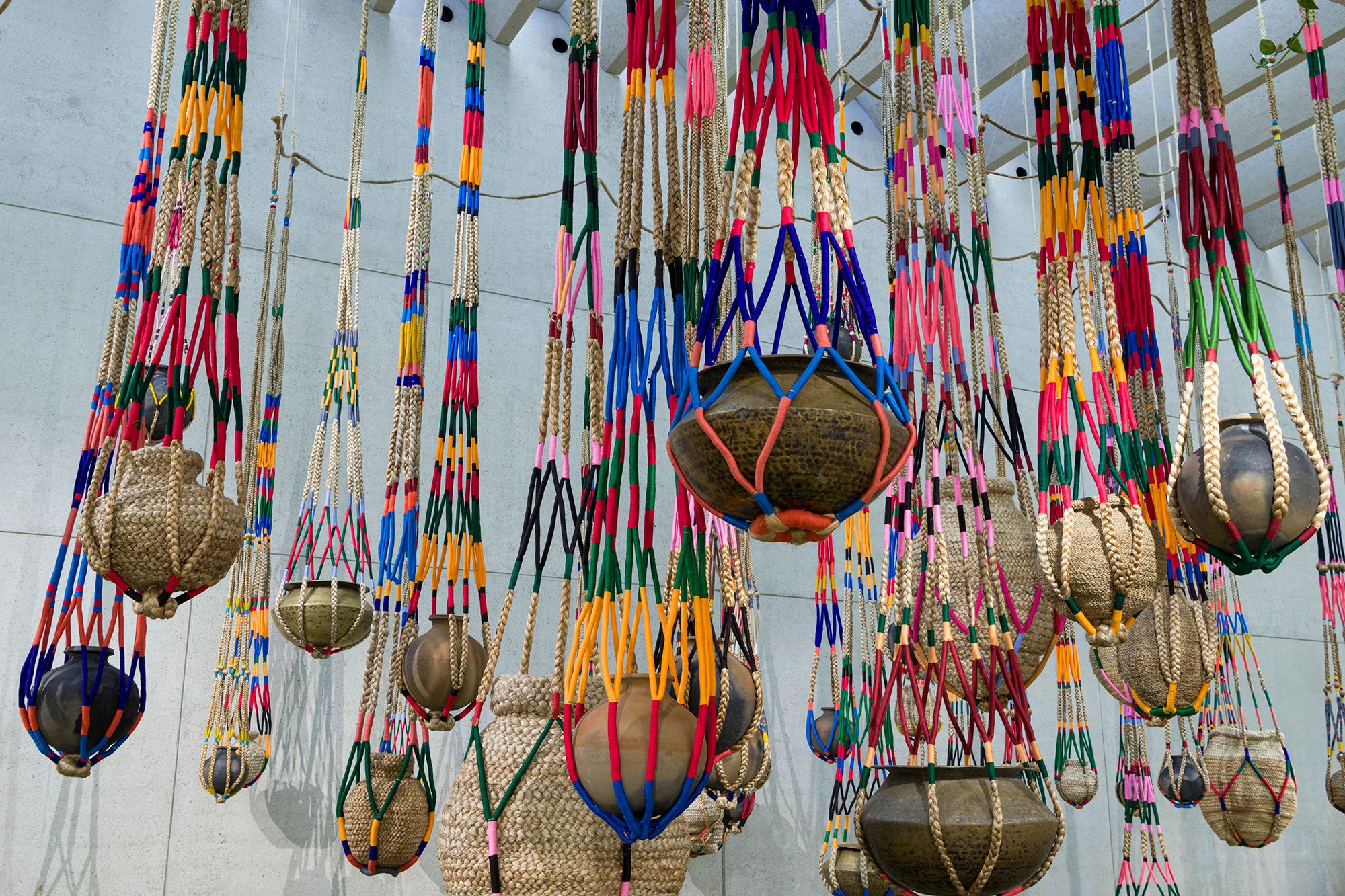 Kamruzzaman Shadhin, Bangladesh b.1974 / Gidree Bawlee Foundation of Arts, Bangladesh, est. 2001; Collaborating artists: Johura Begum, Monowara Begum, Majeda Begum, Fatema Begum (1), Shabnur Begum, Chayna Begum, Fatema Begum (2), Samiron Begum, Shirina Begum, Rekha, Nasima Begum, Shushila Rani, Protima Rani, Akalu Barman / The fibrous souls (detail) 2018–21 / Jute, cotton, thread, clay, brass / 70 pots: 40–100cm each (diam.) (approx.) with 70 shikas of various dimensions / Originally commissioned by Samdani Art Foundation / Purchased 2021 with funds from Metamorphic Foundation through the Queensland Art Gallery | Gallery of Modern Art Foundation / Collection: Queensland Art Gallery | Gallery of Modern Art, Brisbane / © The artists