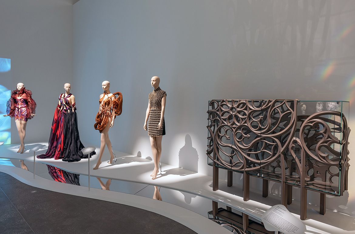 Installation view ‘Iris van Herpen: Sculpting the Senses’, GOMA 2024 featuring Gothik-A Cabinet 2022 by Ferruccio Laviani / Oak, glass / Purchased from Fratelli Boffi, 2023 / Collection: Musée des Arts Décoratifs, Paris / © Ferruccio Laviani / Photograph: N Umek © QAGOMA