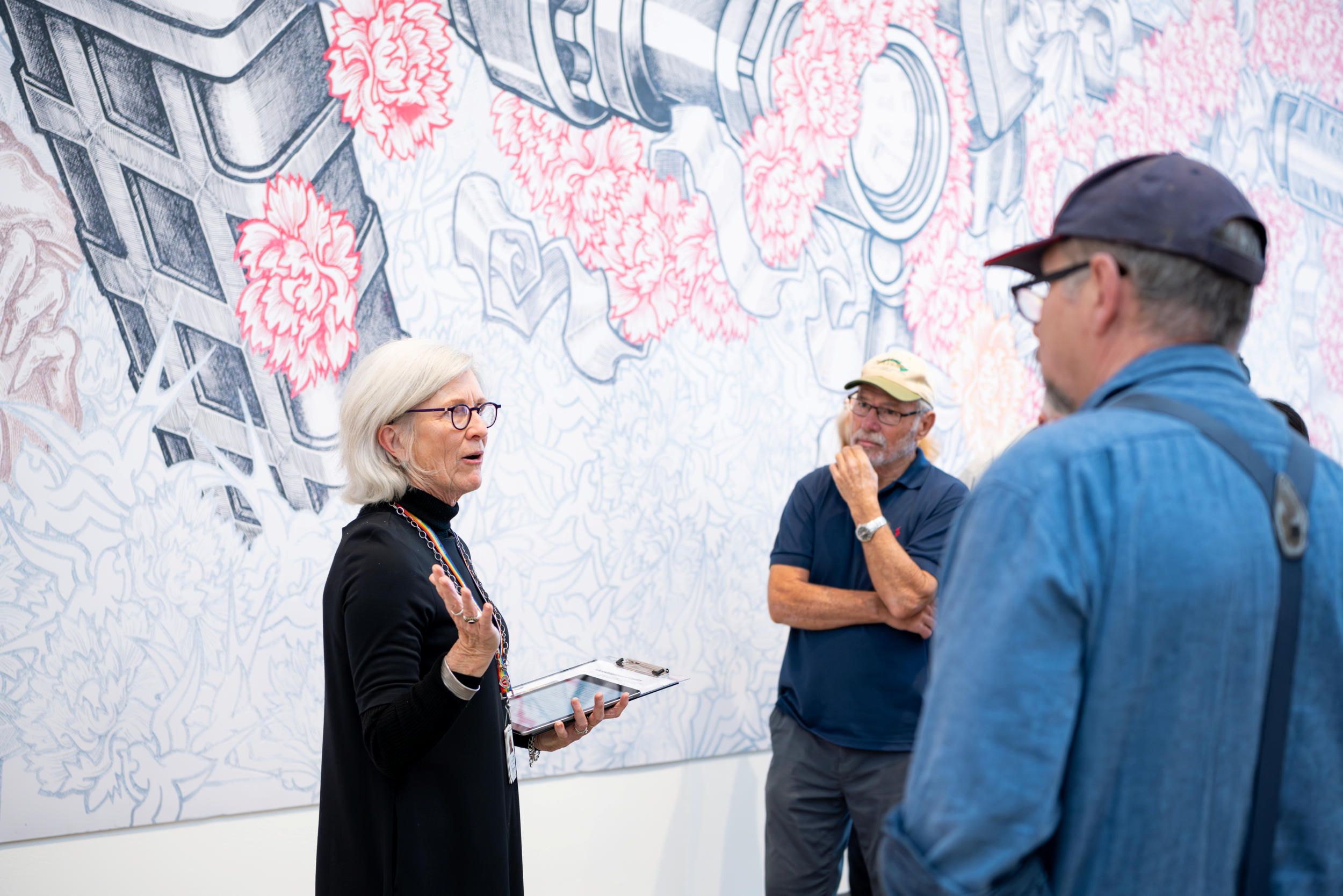 A Volunteer Guide leads visitors on a tour at the Gallery of Modern Art (GOMA) | Photography: Chloe Callistemon | © QAGOMA
